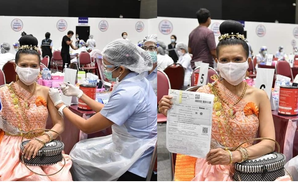 มิติใหม่ฉีดวัคซีนโควิดให้โลกจำ  อดีตผญบ.จัดเต็มแต่งชุดไทยสไบเฉียง