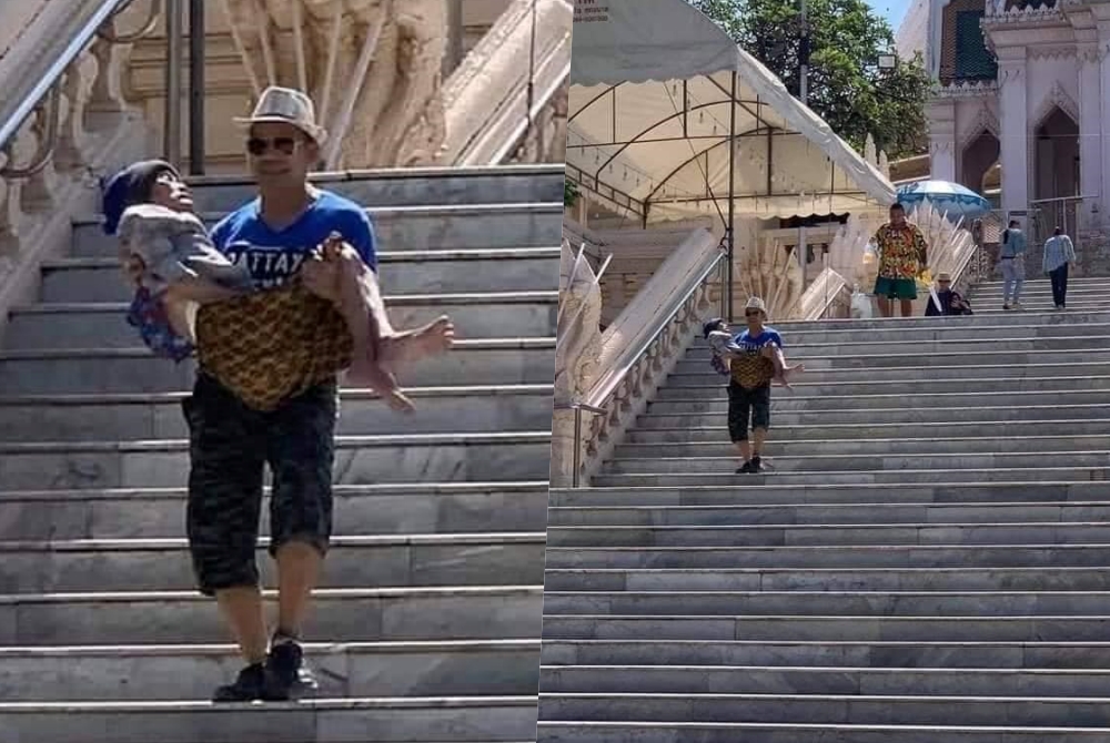 แห่ชื่นชม! หนุ่มอุ้ม “แม่ป่วยติดเตียง” ขึ้นลงบันไดไหว้พระ