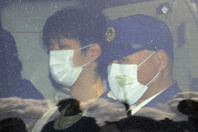 นายเรียวจิ คิมุระ (ซ้าย) (Photo : AFP)